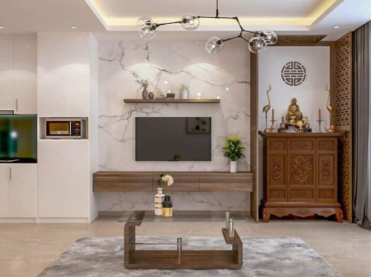 Thiết kế phòng thờ và phòng khách với tông màu trắng chủ đạo tạo cảm giác thông thoáng cho ngôi nhà.